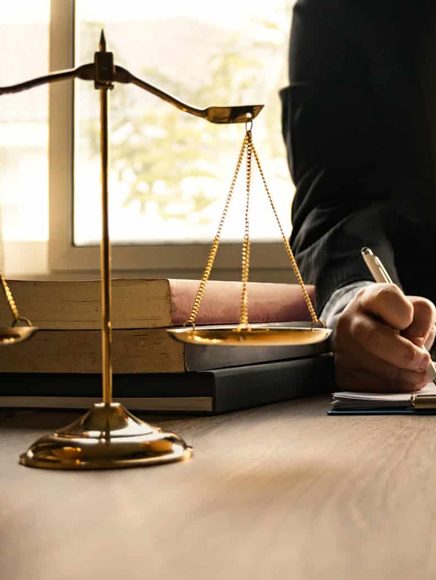 Legal and Attorneys: scales of justice on an attorney's desk