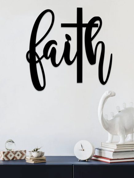 Religion and Faith: the word faith with a cross on a wall at home